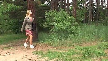 A young blonde sunbathing in a park is attacked and a.
