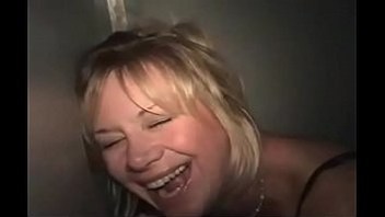Swinger fat mom swallows two stranger's dicks through gloryhole