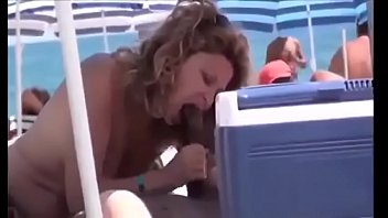 Crown blowjob on nude beach