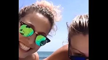 Couple of old women on the beach dashing