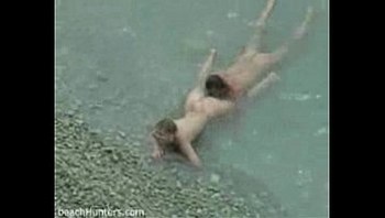 Hidden camera blowjob on the beach