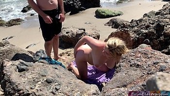 Voluptuous blonde sunbathing nude on the beach fucks passer-by - Erin Electra