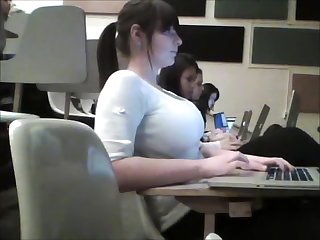 Brunette girl has awesome huge boobs on candid video