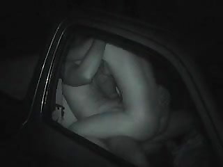 Voyeur films couple in car